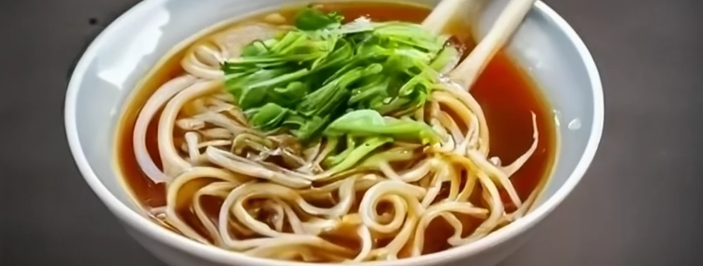 A picture of a bowl of wet noodles
